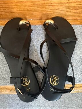 Rialto Black Toe-Ring Strappy Sandals with Gold Accents